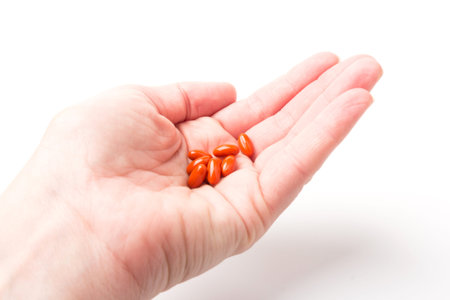 Vitamin Coenzyme Q10 on white background. to prevent aging. Pills and medicine