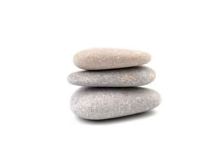 Pile of stones isolated on white background. zen / spa stones studio isolated.