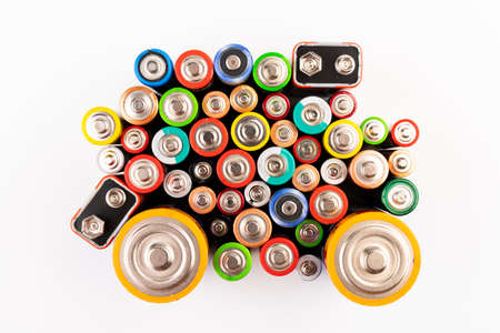 Used batteries-danger to the environment Horizontal shot. Multicolored used electric batteries view from above.の写真素材
