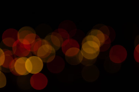 Abstract colorful christmas light. Bokeh background whith de focused lights and copy space.の写真素材