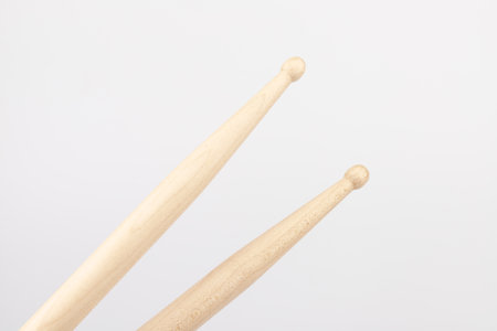 Wooden drumsticks isolated on white background. musical instruments.の写真素材