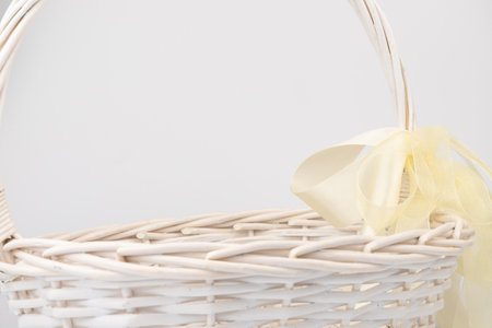 Empty wicker basket. Natural materials rattan bamboo wood used to decorate dishes bread fruit, flowers, Isolated on white background.の写真素材