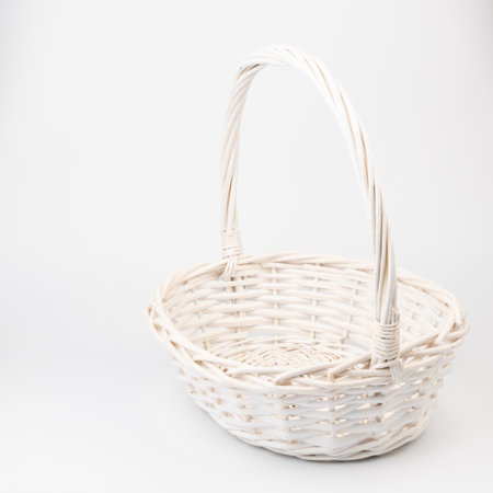 Empty wicker basket. Natural materials rattan bamboo wood used to decorate dishes bread fruit, flowers, Isolated on white background.の写真素材