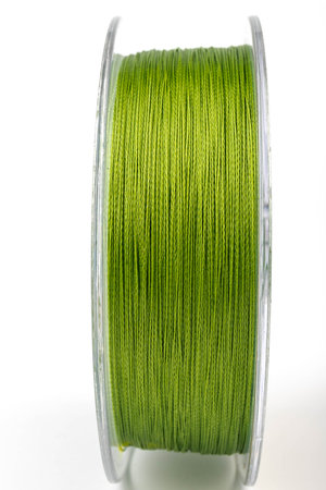 Fishing braided line isolated on white background. Spool of green cord isolated. Spool of braided fishing line.の写真素材