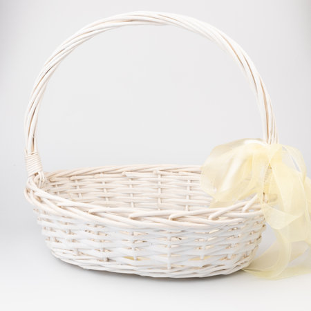 Empty wicker basket. Natural materials rattan bamboo wood used to decorate dishes bread fruit, flowers, Isolated on white background.の写真素材
