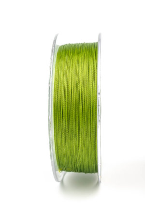 Fishing braided line isolated on white background. Spool of green cord isolated. Spool of braided fishing line.の写真素材