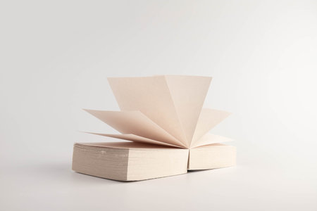 Small gray book open with blank pages. Blank Sticker notes on the white background. sticky Note Paper. Empty sheets for notes.の写真素材