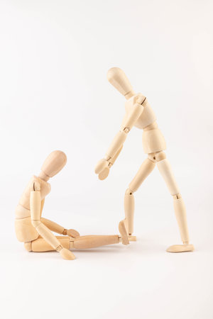 Wooden mannequin, Concern and worry of friend. Mental health, PTSD and suicide prevention.の写真素材