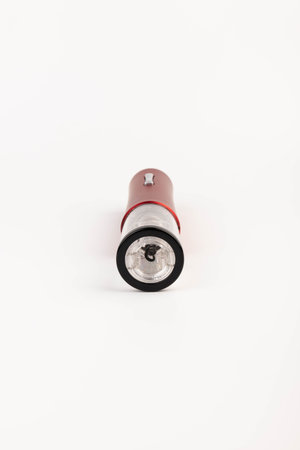 Automatic red corkscrew for opening bottle caps. Electric Wine Bottle Opener