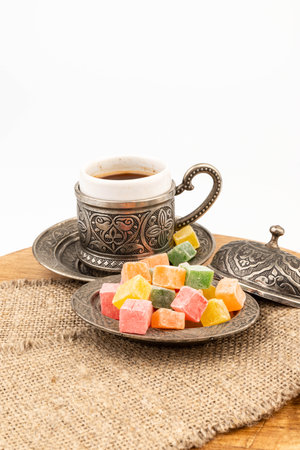 Turkish delight on metal plate isolated on white backgroundの写真素材