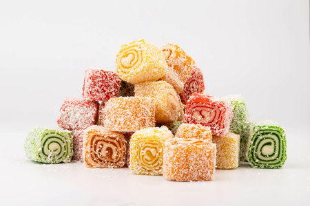 Traditional Turkish delight isolated on white background. Sweet delicious lukum colorの写真素材