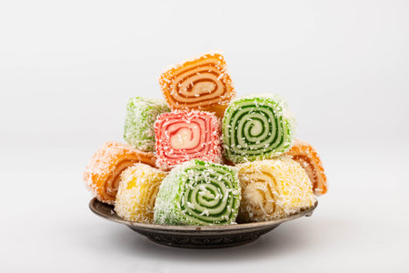 Traditional Turkish delight isolated on white background. Sweet delicious lukum colorの写真素材