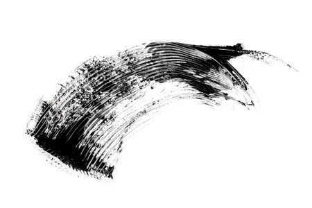Smudged black mascara on white background. Cosmetic product swatch. Paint brush strokeの写真素材