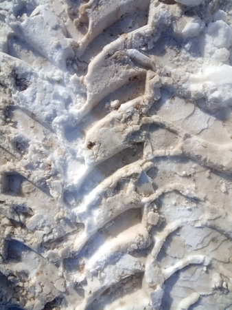 tire track in snow, tread in dirty snow