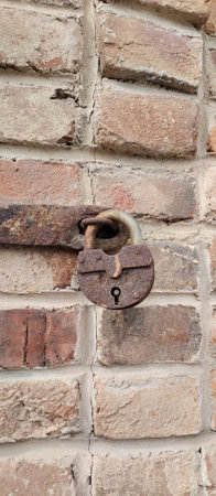 old rusty lock on the wallの写真素材