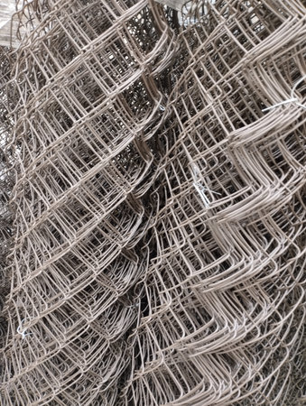 close up of a fishing net in a fishing port, detail of a fishing net
