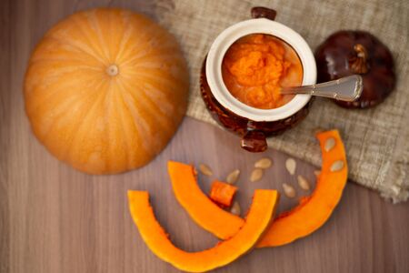pumpkin milk soup in a pot, close-upの写真素材