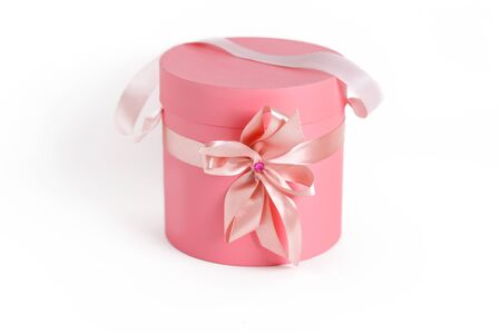 pink gift boxes in round shape isolatedの写真素材