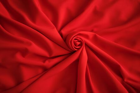 Red batiste made of cotton. sample of red soft fabric with pleatsの写真素材