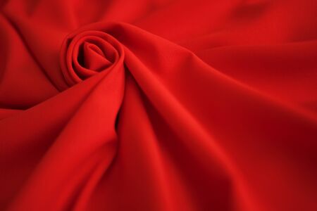 Red batiste made of cotton. sample of red soft fabric with pleatsの写真素材