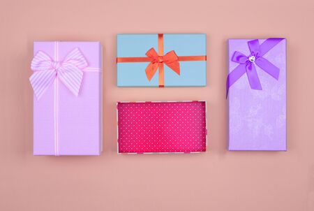 colorful rectangular gift boxes with bowの写真素材