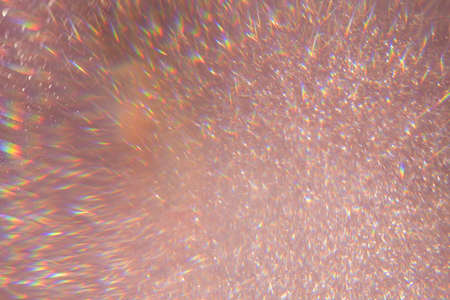 Sparkling bokeh background in a fresh pink color. pink sequins flares background defocusの写真素材