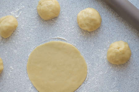 Step-by-step instructions for making bagel cookies for use in recipe illustrations. Balls of dough, blanks. step 2の写真素材