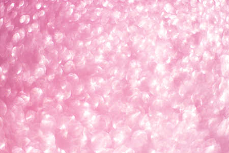 Sparkling bokeh background in a fresh pink color. pink sequins backgroundの写真素材