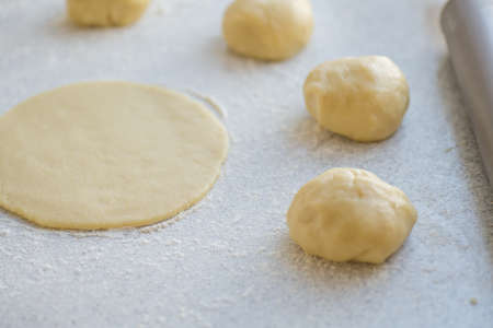 Step-by-step instructions for making bagel cookies for use in recipe illustrations. Balls of dough, blanks. step 2の写真素材