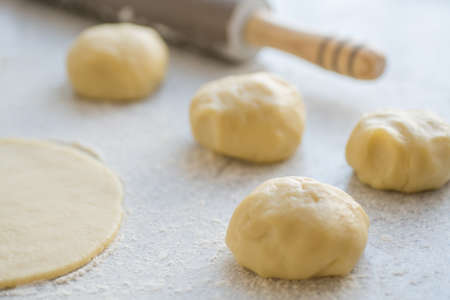Step-by-step instructions for making bagel cookies for use in recipe illustrations. Balls of dough, blanks. step 2の写真素材