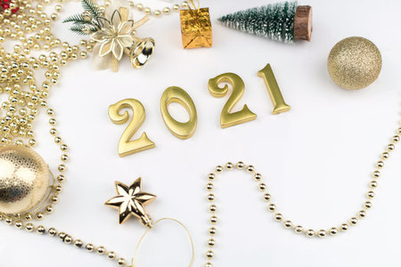 Happy New Year 2021. Sparkling numbers Year 2021 isolated on white background. golden overlay object...