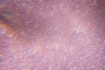 Sparkling bokeh background in a fresh pink color. pink sequins flares background defocusの写真素材