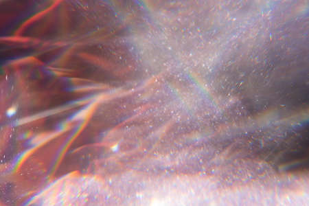Gold pink sequins, highlights sparkling carpet. Close-up, very shallow depth of field . Macro.の写真素材