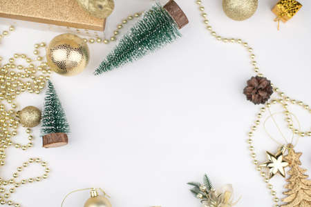 Christmas attributes, Christmas tree decor, gifts on the background of Golden bokeh, New year 2021.の写真素材