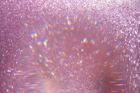 Gold pink sequins, highlights sparkling carpet. Close-up, very shallow depth of field, Macro.の写真素材