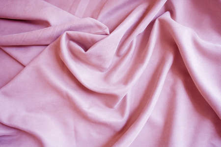 Pink velour pleats. Soft blackout curtains for the room. Fabric for tailoringの写真素材