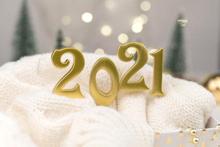 Year 2021 numbers on Golden bokeh background New year mood, Christmas, greeting card, new year...