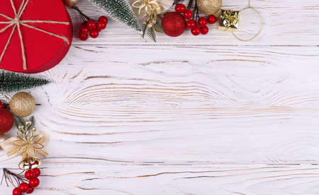 Christmas white wooden background with red gift box. top view. Holiday Greeting Cards. Copy Spaceの写真素材