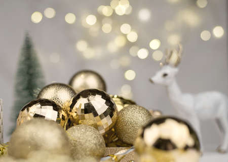 New Year golden balls on Golden bokeh background New year mood, Christmas, greeting card, new year backgroundの写真素材