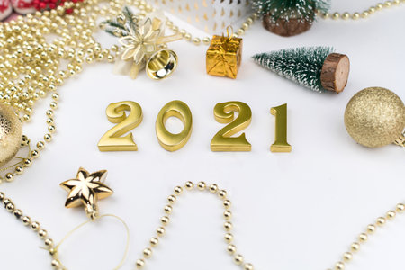 Happy New Year 2021. Sparkling gold numbers on white background. object for design holiday greeting card,の写真素材