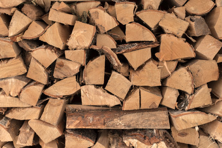 The woodpile, firewood as a background, chopped wood masonryの写真素材
