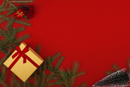 Frame of Christmas decorations on a red background.Flatly, CopySpaceの写真素材