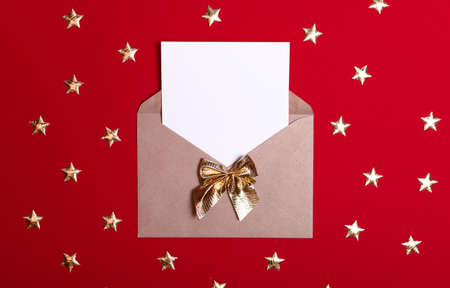 Envelope letter with an empty gladent and a place for text on a red background with stars.の写真素材