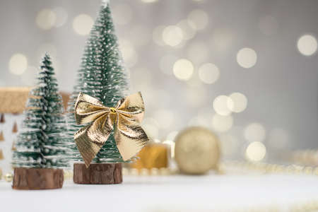 Christmas attributes, Christmas tree decor, gifts on the background of Golden bokeh, New year 2021.の写真素材