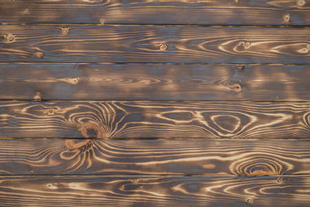 texture of burnt brown dark wood, blackboard background.の写真素材
