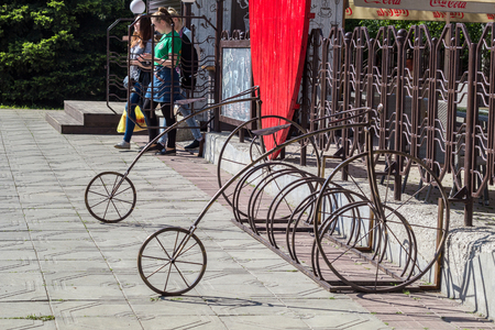 POLTAVA, UKRAINE - May 15, 2018: Bicycle park in the Hull Garden near the cafeのeditorial素材