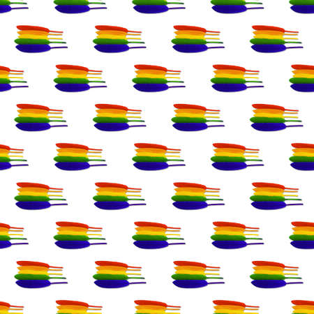 Seamless pattern of lined in rainbow colored bird feathers on a white background. LGBT concept. High quality photoの写真素材