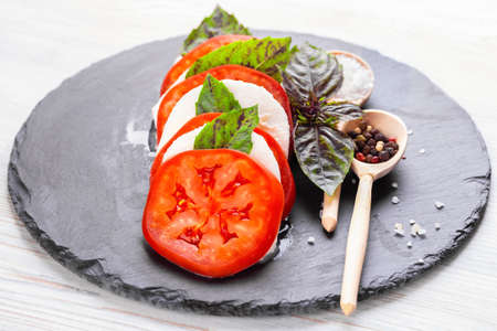 Homemade caprese salad close-up. Healthy eating concept. High quality photoの写真素材