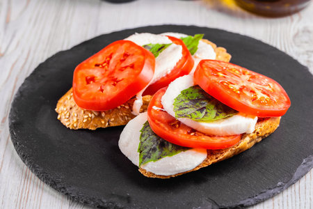 Homemade caprese bruschetta. Healthy eating concept. High quality photoの写真素材