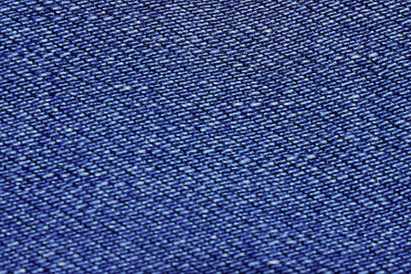 blue texture maden from a piece of jeans blurred toned
